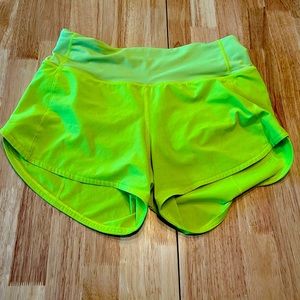 Neon yellow lulu running shorts